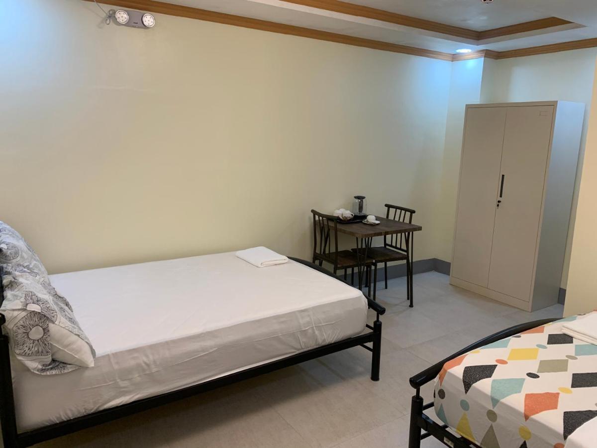 Zl Travelers Inn Batuan Exterior photo